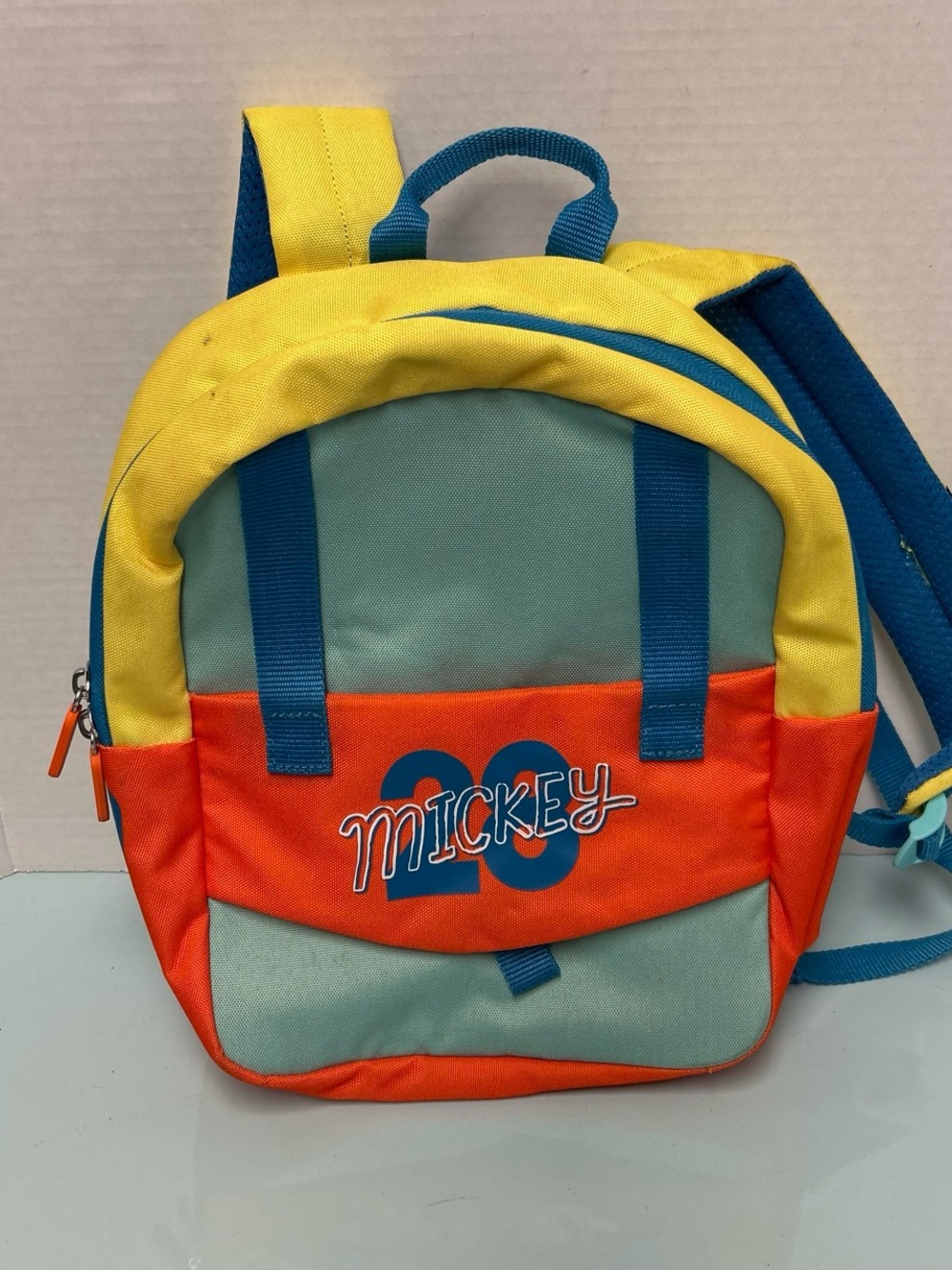 American Tourister Kids Colorblock Backpack - Yellow, Orange, Teal, Blue